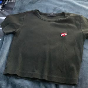 Has a heart with me in it in at the top right Corner